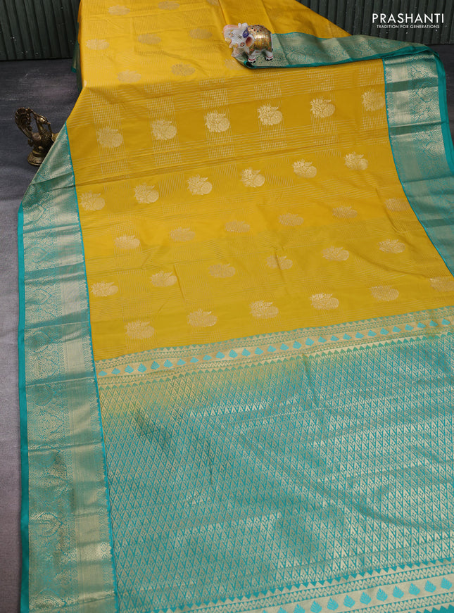 Semi kanchipuram silk saree mustard yellow and teal green with allover zari checks & buttas and zari woven korvai border