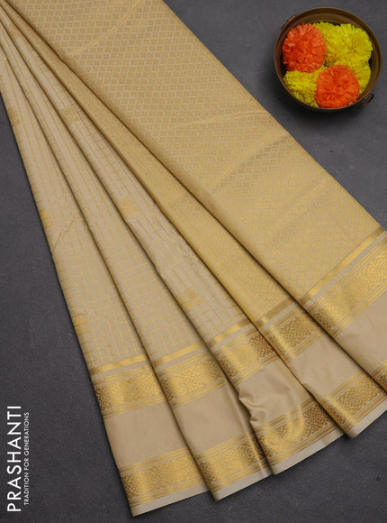 Semi kanchipuram silk saree sandal with allover zari checks & buttas and rettapet zari woven border
