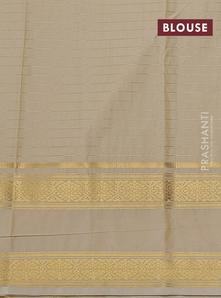 Semi kanchipuram silk saree sandal with allover zari checks & buttas and rettapet zari woven border