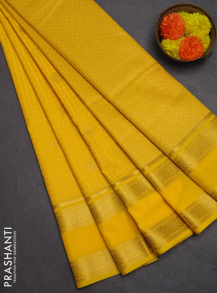 Semi kanchipuram silk saree yellow with allover zari checks & buttas and rettapet zari woven border