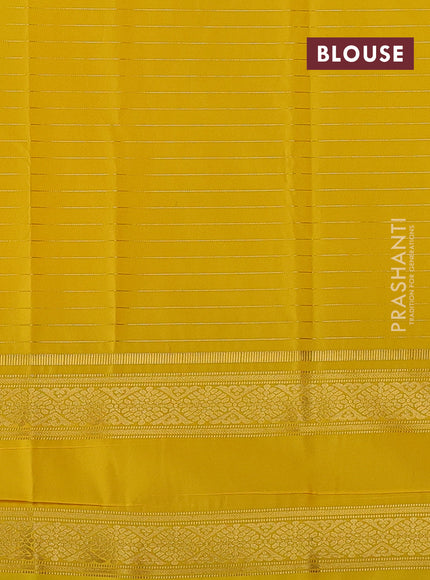 Semi kanchipuram silk saree yellow with allover zari checks & buttas and rettapet zari woven border