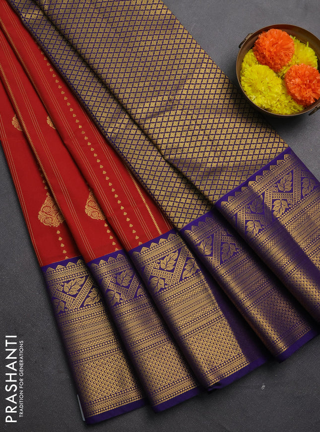 Semi kanchipuram silk saree rust shade and navy blue with allover zari weaves & buttas and long zari woven korvai border