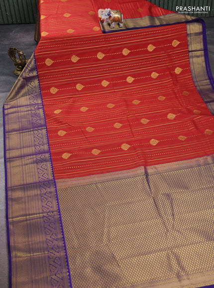 Semi kanchipuram silk saree rust shade and navy blue with allover zari weaves & buttas and long zari woven korvai border