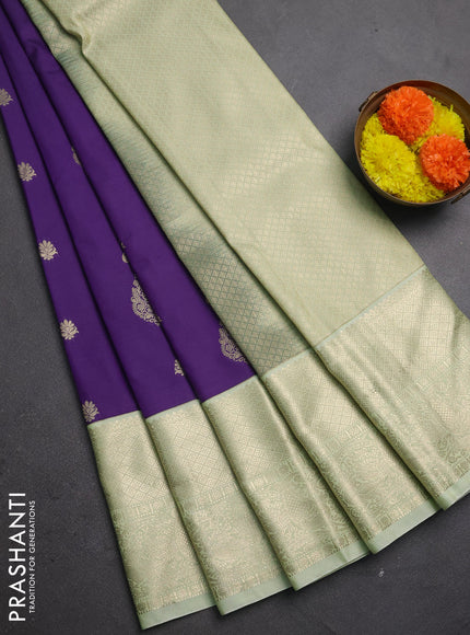 Semi kanchipuram silk saree purple and mild pista green with zari woven buttas and long zari woven korvai border