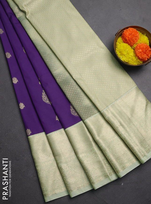 Semi kanchipuram silk saree purple and mild pista green with zari woven buttas and long zari woven korvai border