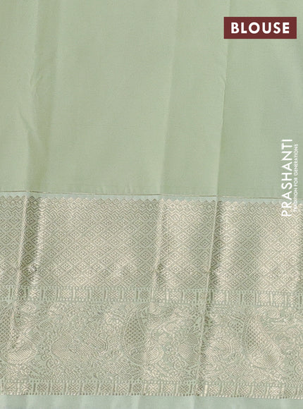 Semi kanchipuram silk saree purple and mild pista green with zari woven buttas and long zari woven korvai border