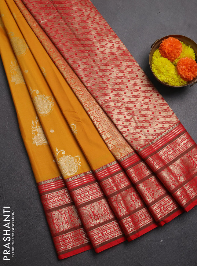 Semi kanchipuram silk saree mustard yellow and red with zari woven buttas and zari woven korvai border