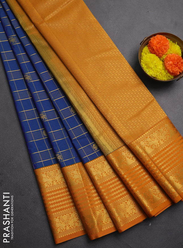 Semi kanchipuram silk saree dual shade of bluish green and dark mustard with allover zari checks & buttas and long zari woven border