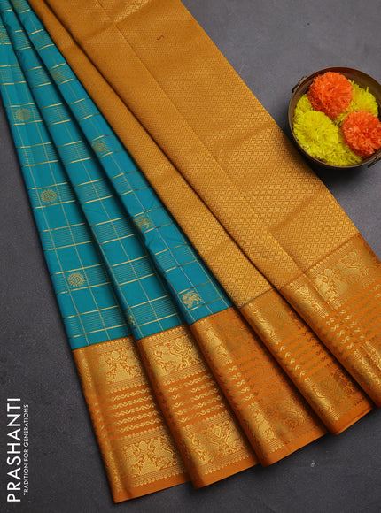 Semi kanchipuram silk saree dual shade of teal green and dark mustard with allover zari checks & buttas and long zari woven border