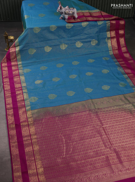 Semi kanchipuram silk saree teal blue and magenta pink with allover zari checks & buttas and rettapet zari woven korvai border