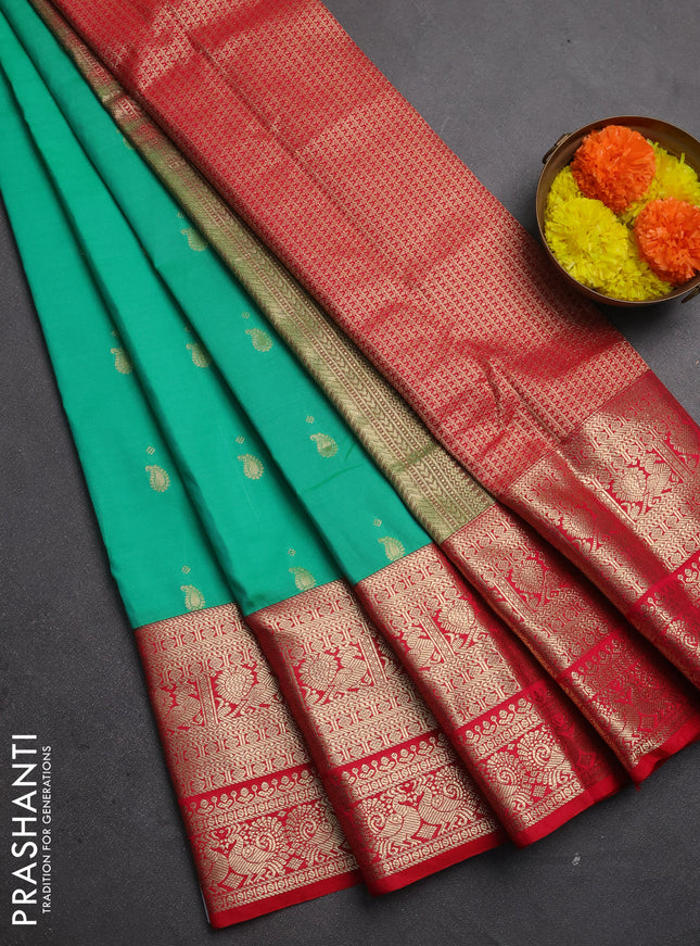 Semi kanchipuram silk saree teal green and tomato pink with zari woven buttas and long zari woven border