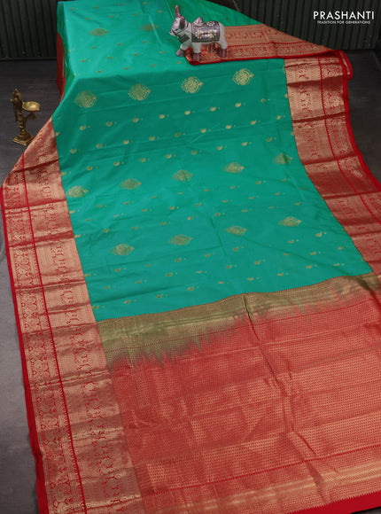 Semi kanchipuram silk saree teal green and tomato pink with zari woven buttas and long zari woven border
