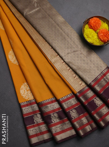Semi kanchipuram silk saree mustard yellow and wine shade with zari woven buttas and long zari woven korvai border