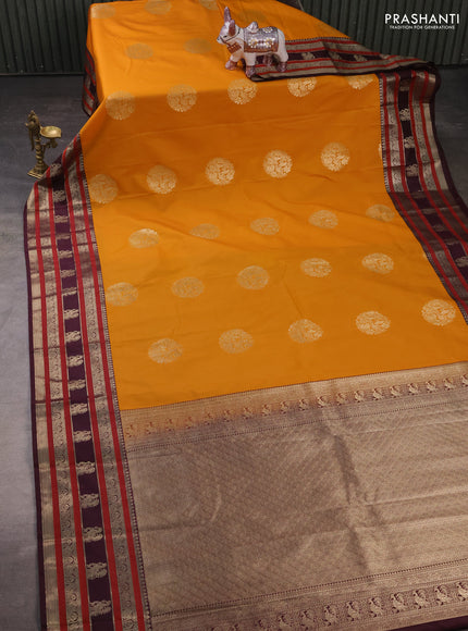 Semi kanchipuram silk saree mustard yellow and wine shade with zari woven buttas and long zari woven korvai border
