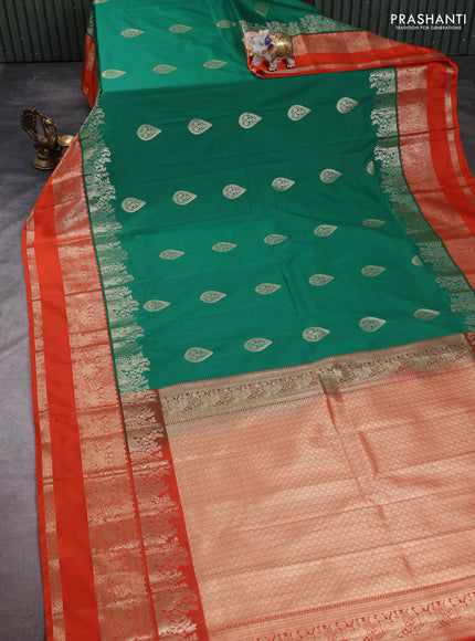 Semi kanchipuram silk saree green and orange with zari woven buttas and long rettapet zari woven korvai border