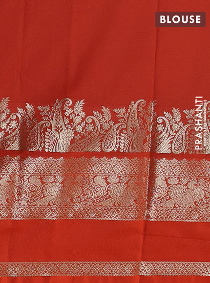 Semi kanchipuram silk saree green and orange with zari woven buttas and long rettapet zari woven korvai border