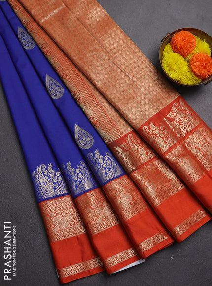 Semi kanchipuram silk saree blue and orange with zari woven buttas and long rettapet zari woven korvai border