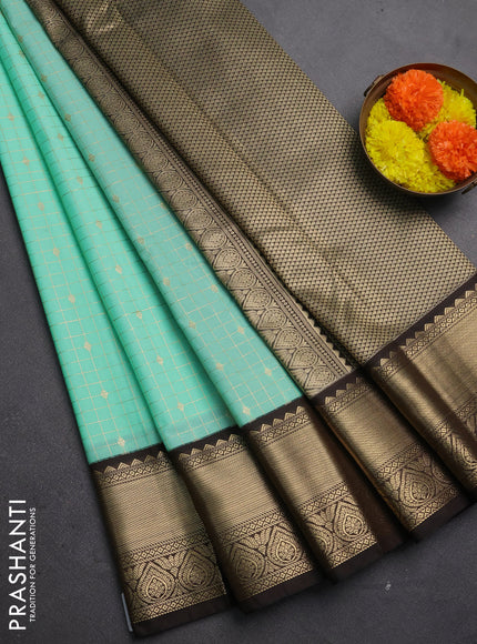 Semi kanchipuram silk saree mild teal and coffee brown with allover zari checks & buttas and rich zari woven korvai border