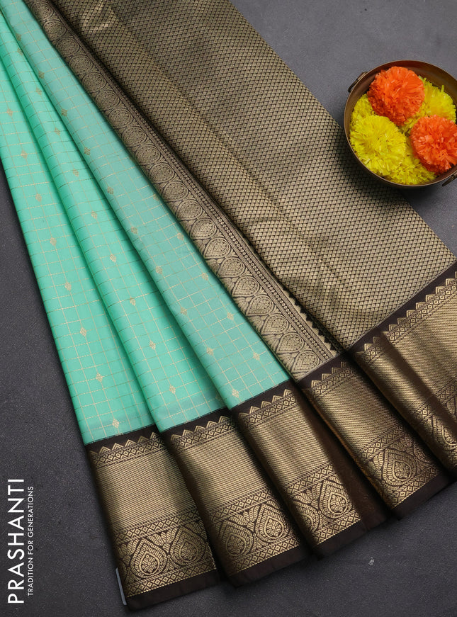 Semi kanchipuram silk saree mild teal and coffee brown with allover zari checks & buttas and rich zari woven korvai border