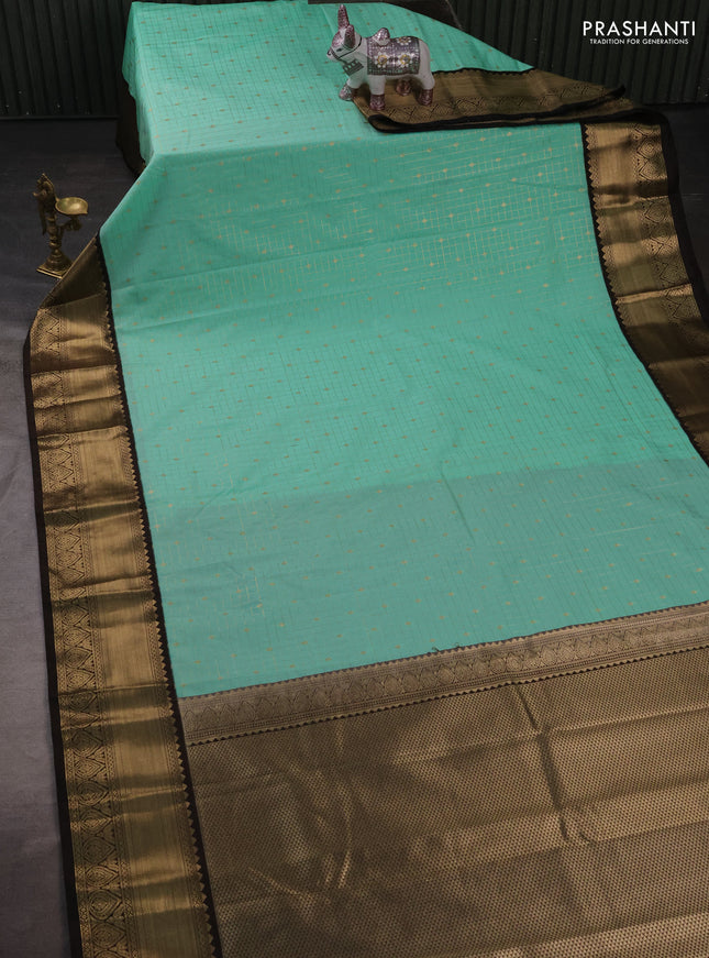 Semi kanchipuram silk saree mild teal and coffee brown with allover zari checks & buttas and rich zari woven korvai border