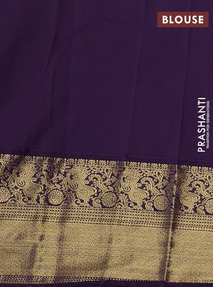 Semi kanchipuram silk saree light green and purple with zari woven buttas and zari woven korvai border