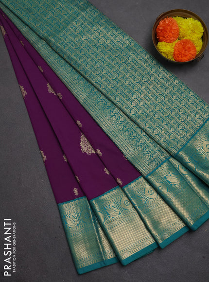 Semi kanchipuram silk saree purple and teal green with zari woven buttas and zari woven korvai border