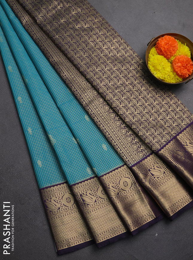 Semi kanchipuram silk saree teal green and deep purple with allover zari checks & buttas and zari woven korvai border