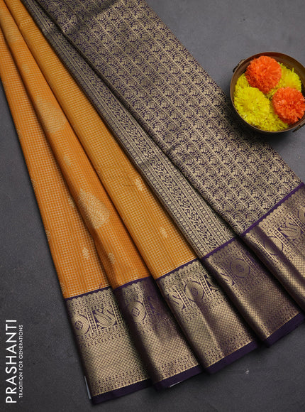 Semi kanchipuram silk saree mustard yellow and deep purple with allover zari checks & buttas and zari woven korvai border