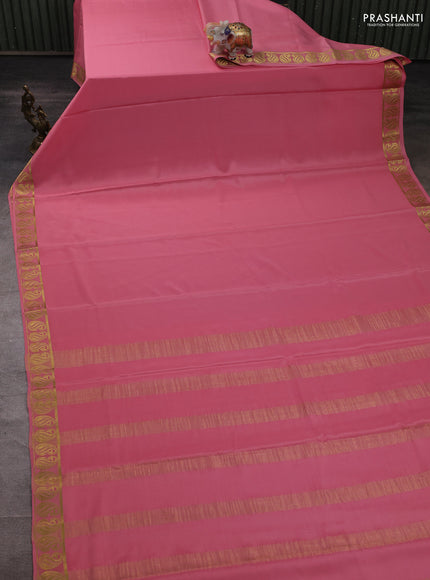 Pure mysore silk saree peach shade with plain body and zari woven paisley border