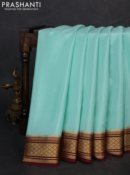 Pure mysore silk saree teal blue and deep maroon with plain body and zari woven border