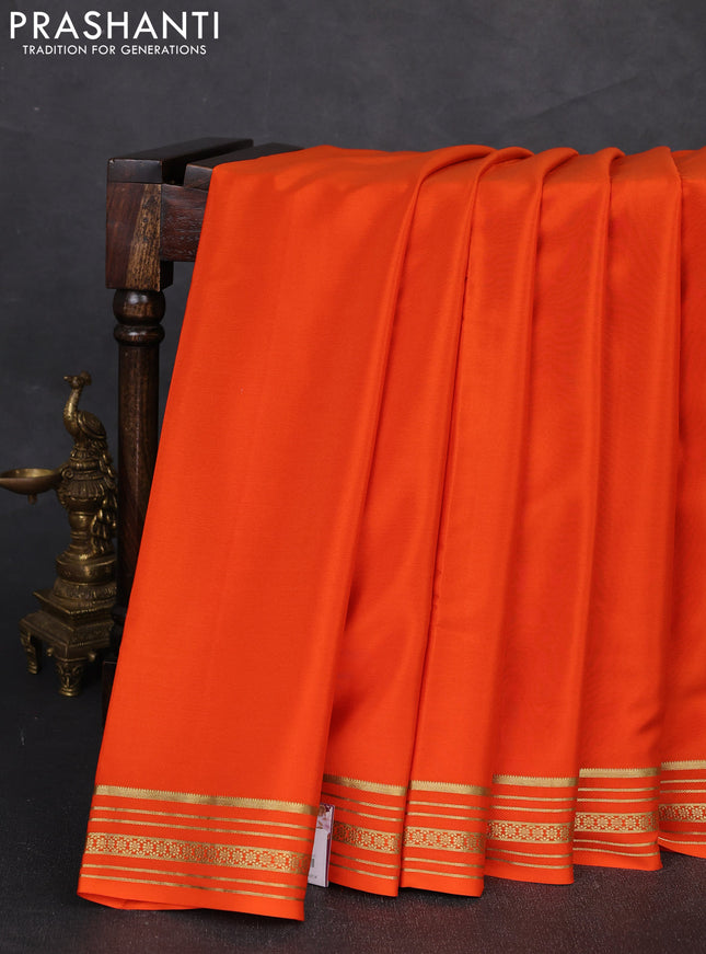 Pure mysore silk saree orange with plain body and zari woven border
