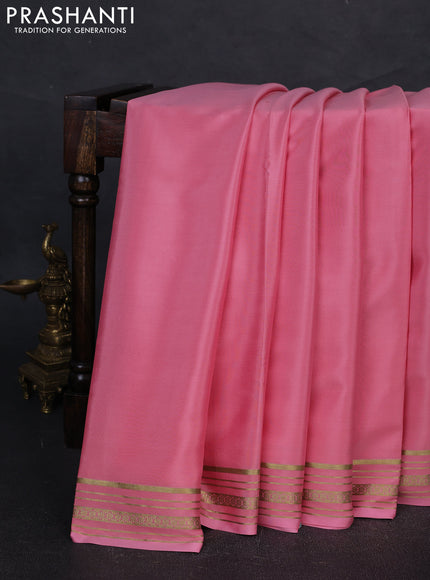 Pure mysore silk saree mild peach pink with plain body and zari woven border