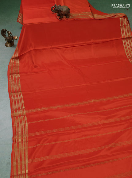 Pure mysore silk saree orange with plain body and zari woven border