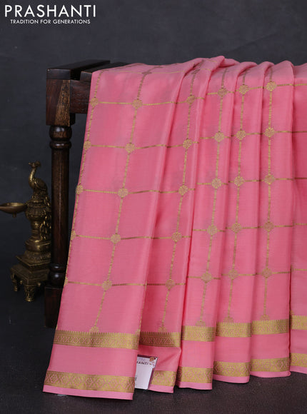Pure mysore silk saree peach shade with allover zari woven checked pattern and rettapet zari woven border