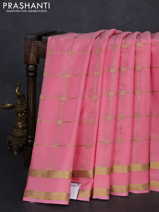 Pure mysore silk saree peach shade with allover zari woven checked pattern and rettapet zari woven border