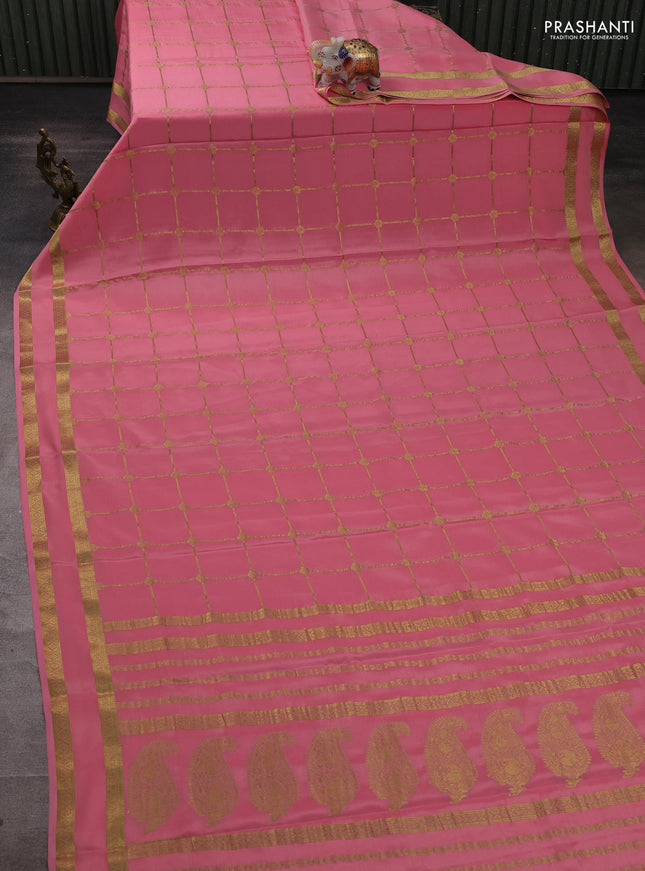 Pure mysore silk saree peach shade with allover zari woven checked pattern and rettapet zari woven border