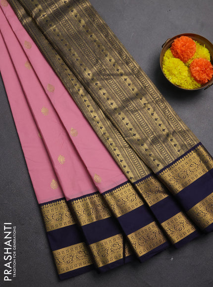 Semi kanchipuram silk saree pastel pink and navy blue with zari woven buttas and rettapet zari woven korvai border