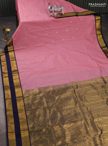 Semi kanchipuram silk saree pastel pink and navy blue with zari woven buttas and rettapet zari woven korvai border
