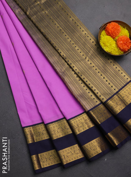 Semi kanchipuram silk saree lotus pink and navy blue with zari woven buttas and rettapet zari woven korvai border