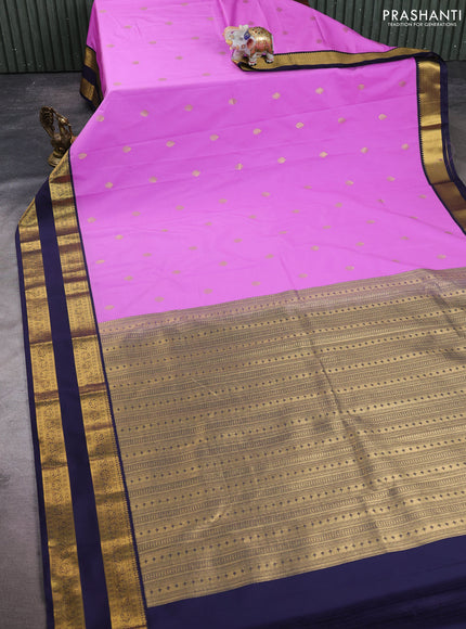 Semi kanchipuram silk saree lotus pink and navy blue with zari woven buttas and rettapet zari woven korvai border