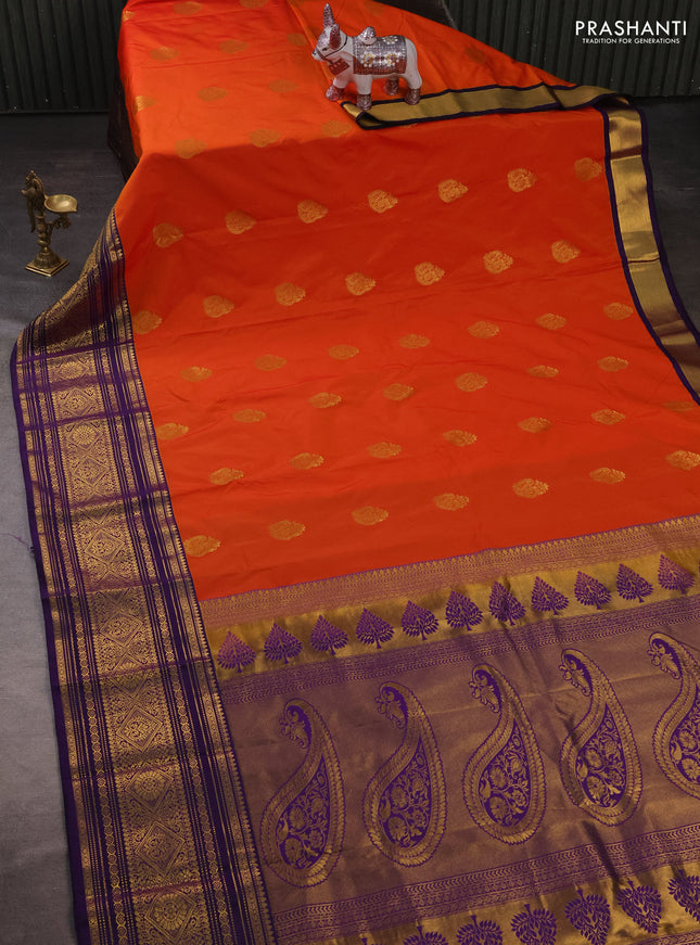 Semi kanchipuram silk saree orange and purple with zari woven buttas and long zari woven korvai border