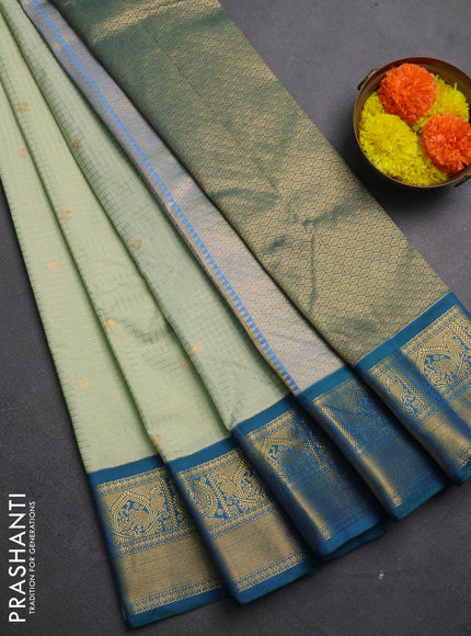Semi kanchipuram silk saree pista green and teal green with allover zari checks & buttas and zari woven border