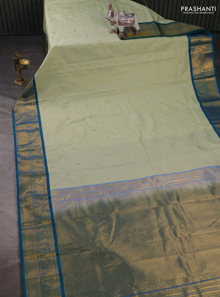 Semi kanchipuram silk saree pista green and teal green with allover zari checks & buttas and zari woven border