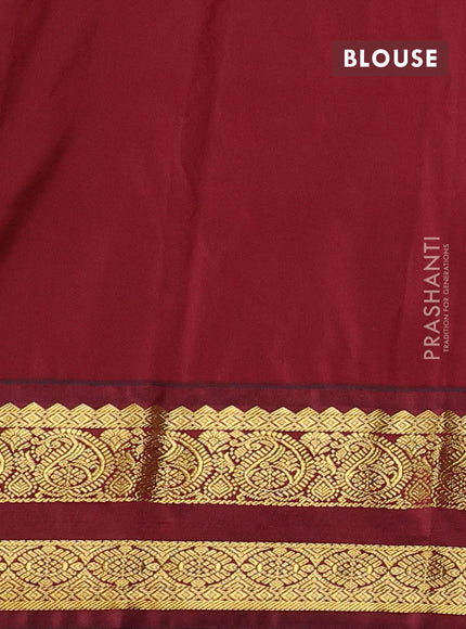 Semi kanchipuram silk saree peacock green and deep maroon with allover zari stripes & buttas and rettapet zari woven korvai border