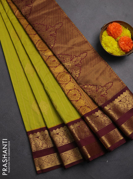 Semi kanchipuram silk saree lime green and deep maroon with allover zari stripes & buttas and rettapet zari woven korvai border