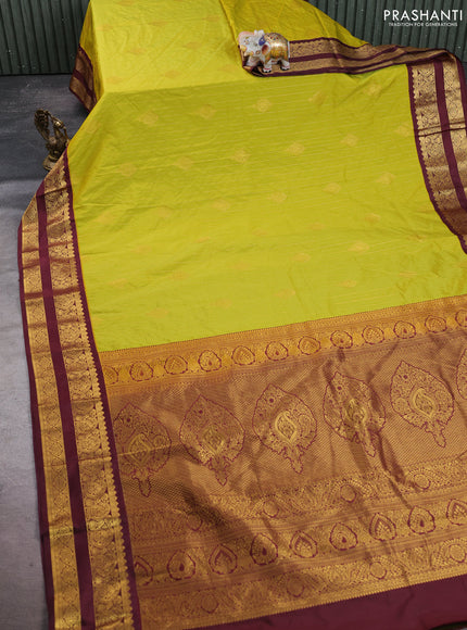Semi kanchipuram silk saree lime green and deep maroon with allover zari stripes & buttas and rettapet zari woven korvai border