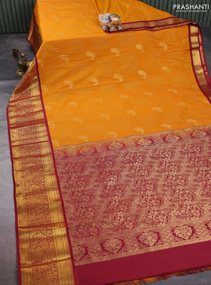Semi kanchipuram silk saree mustard yellow and maroon with allover zari weaves & buttas and long rich zari woven korvai border