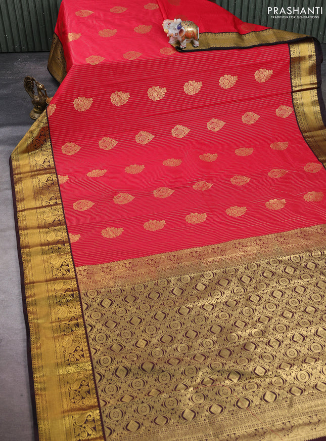 Semi kanchipuram silk saree red and coffee brown with allover zari stripes & buttas and rich zari woven korvai border