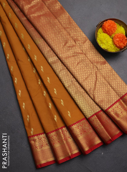 Semi kanchipuram silk saree dark mustard and red with zari woven buttas and zari woven korvai border