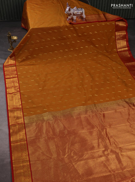 Semi kanchipuram silk saree dark mustard and red with zari woven buttas and zari woven korvai border